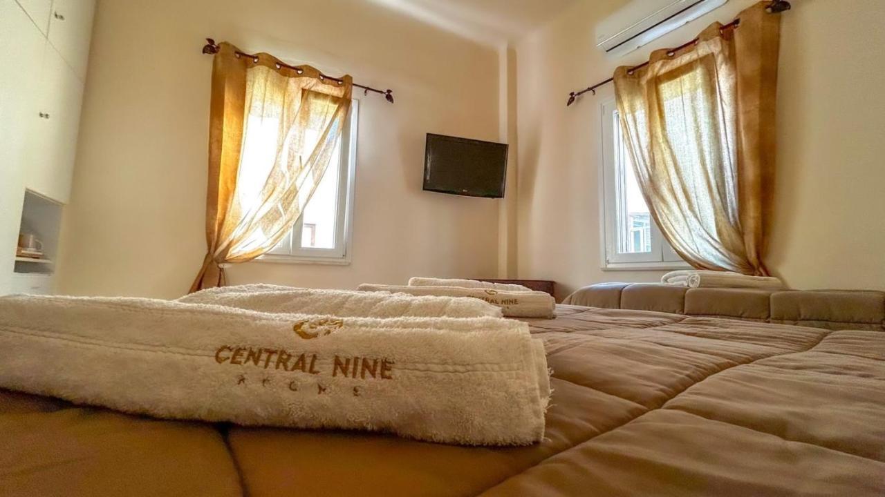 Central 9 Rooms Ermoupoli Bagian luar foto